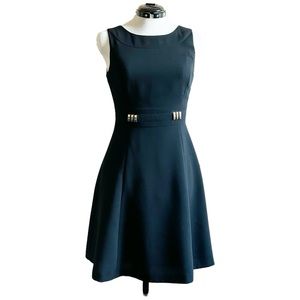 Tahari black crepe a-line dress w/ metal accent, business, fully lined